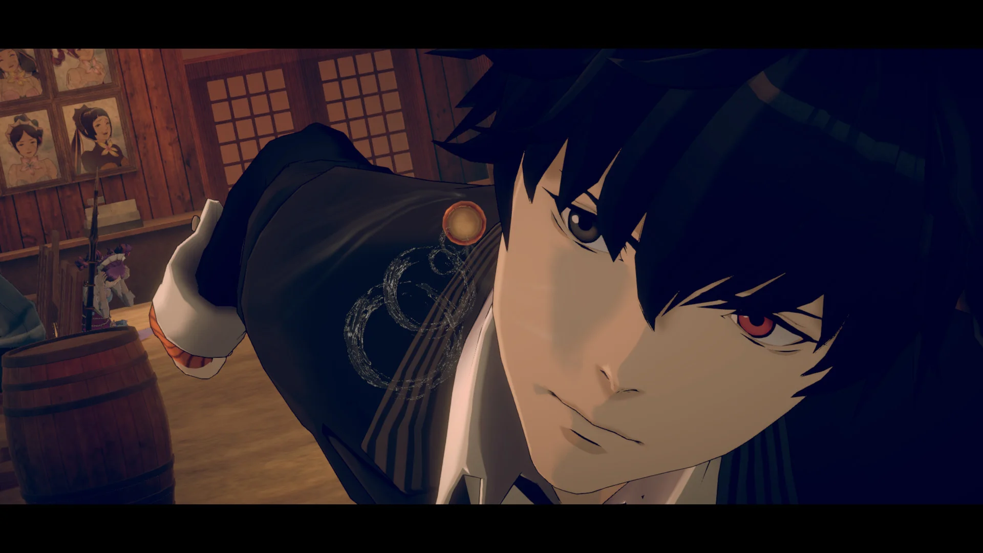 Close view of a dark-haired man looking downward
