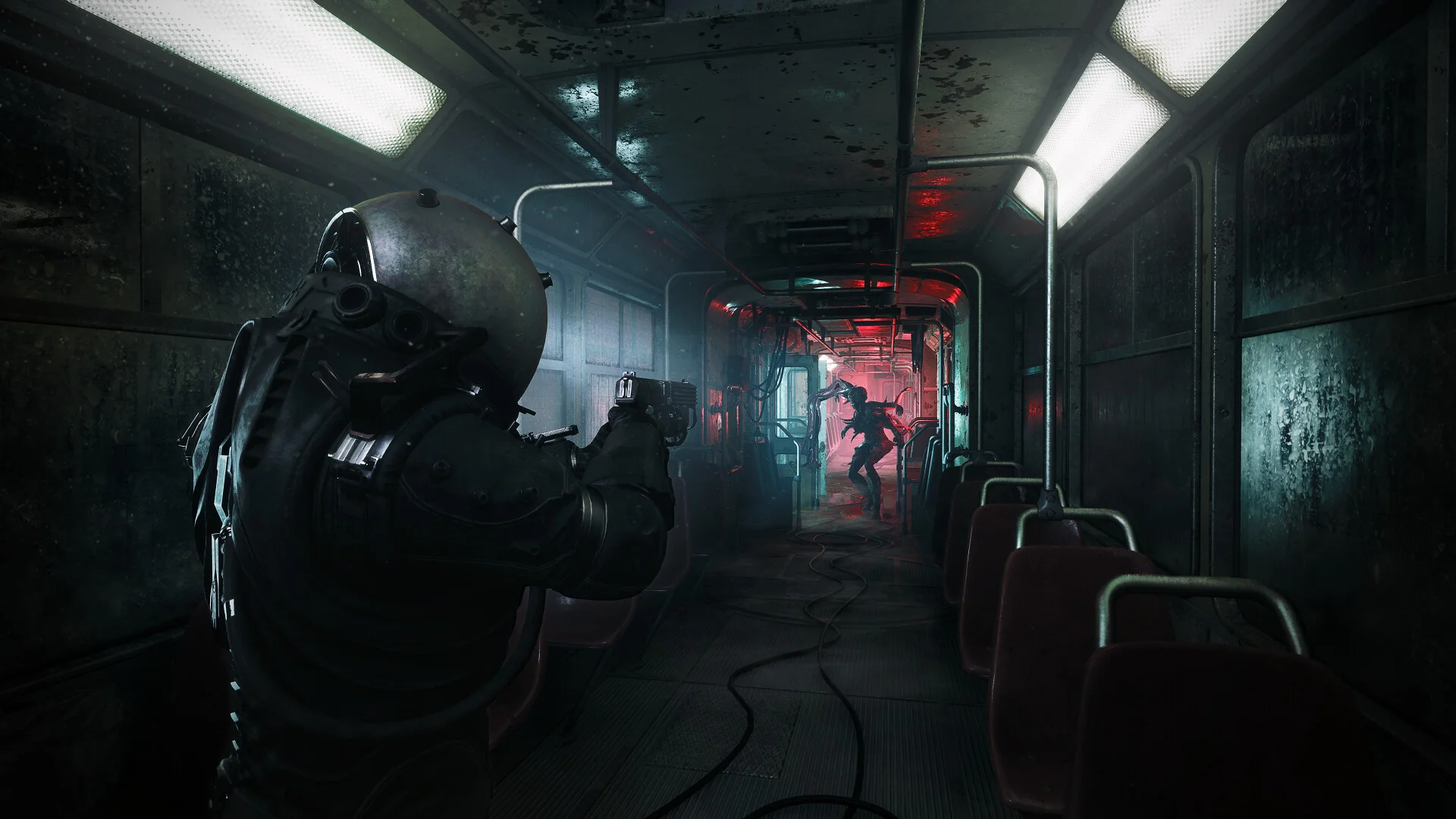 A helmeted Traveler aims down a tram car at a creature under red light